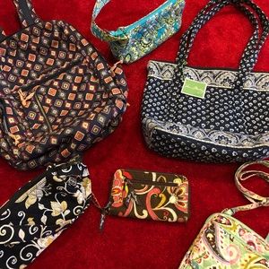 Four Vera Bradley purses, one Vera Bradley backpack, one Vera Bradley wallet.